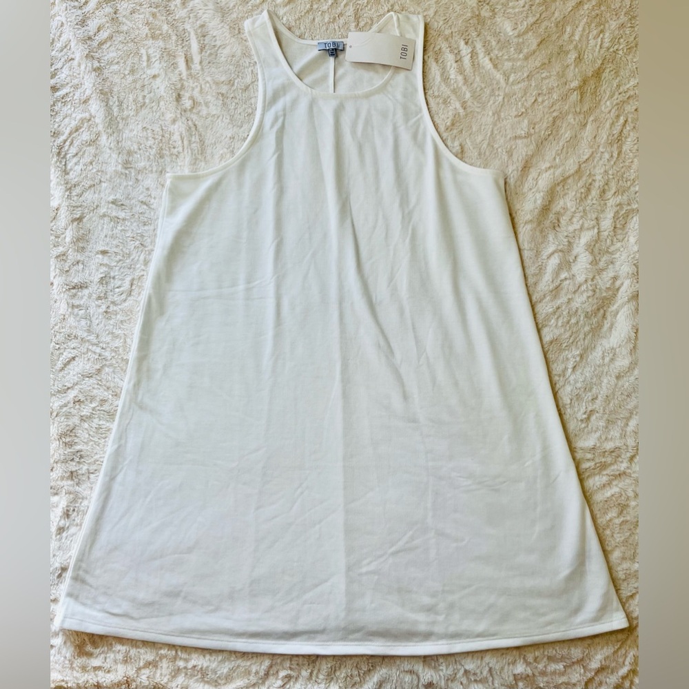 White summer dress size Large but more on XL.